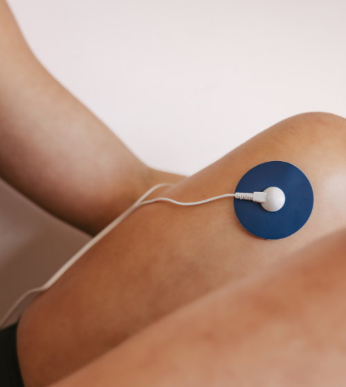 Relief Pro knee pad in blue TENs machine