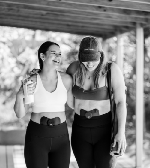 Relief Pro wearable TENS device on lower abdomen.