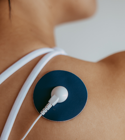 Relief Pro blue pads positioned across upper back and shoulders.